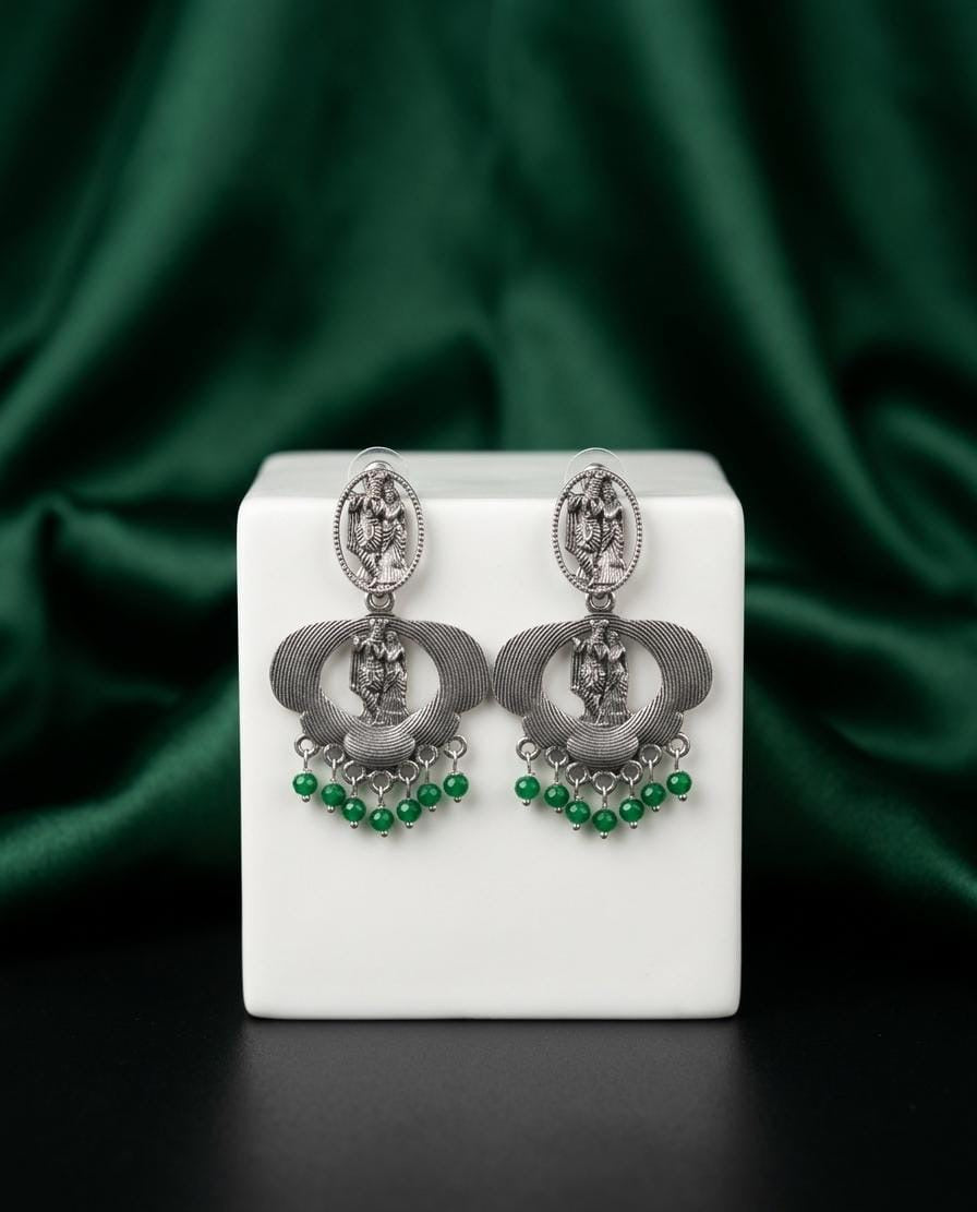 Radhakrishna Silver Coloured Jhumka with Green Beads