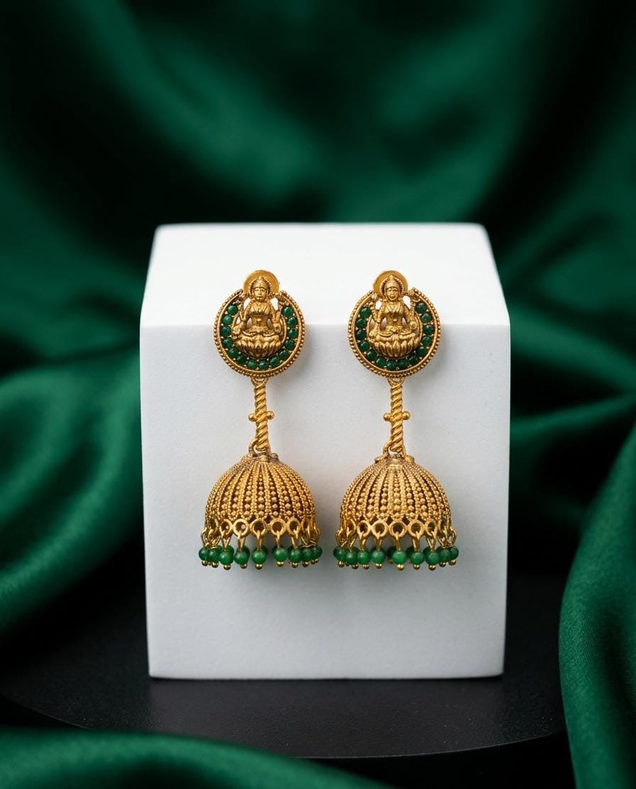 Gold earrings with green beads