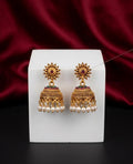 Gold earrings with pearl accents