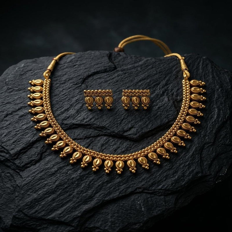 Gold necklace and earrings