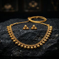 Gold necklace and earrings