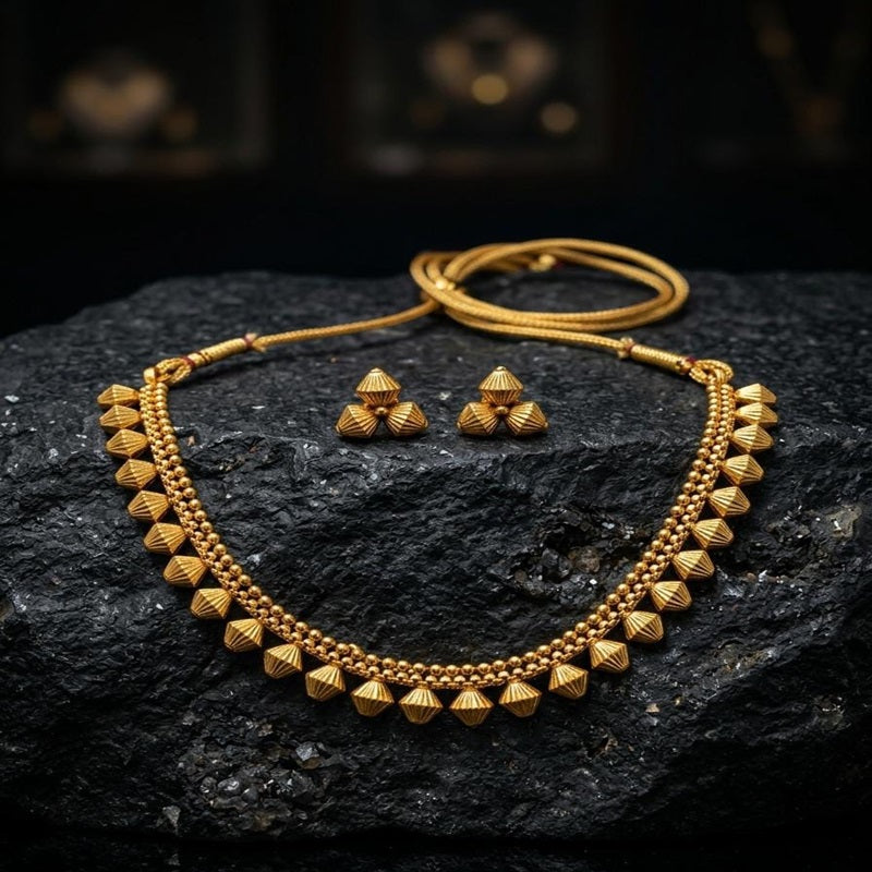 Gold necklace and earrings