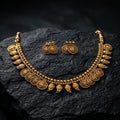Gold necklace and earrings