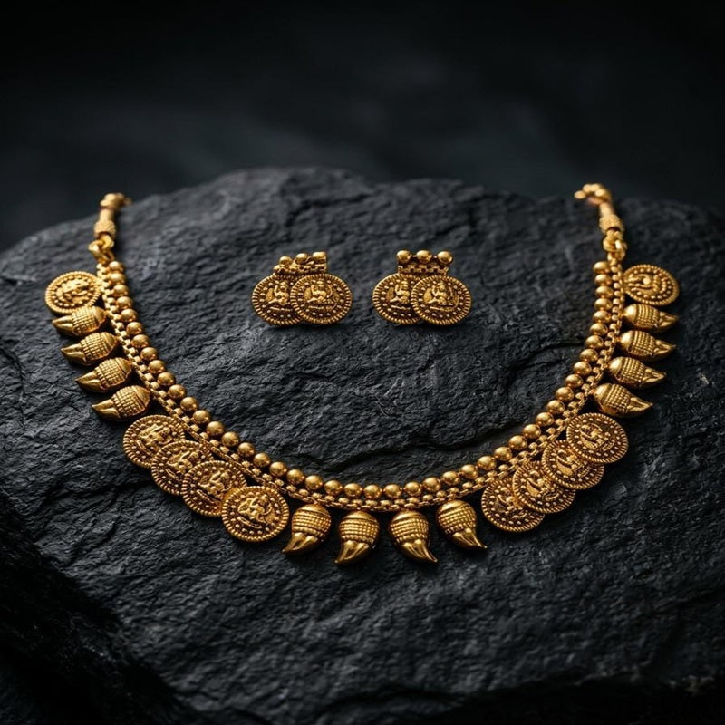 Gold necklace and earrings