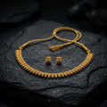 Gold necklace and earrings