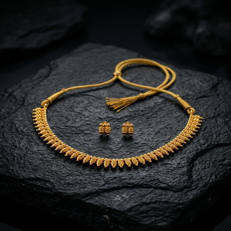 Gold necklace and earrings