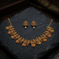 Gold necklace and earrings