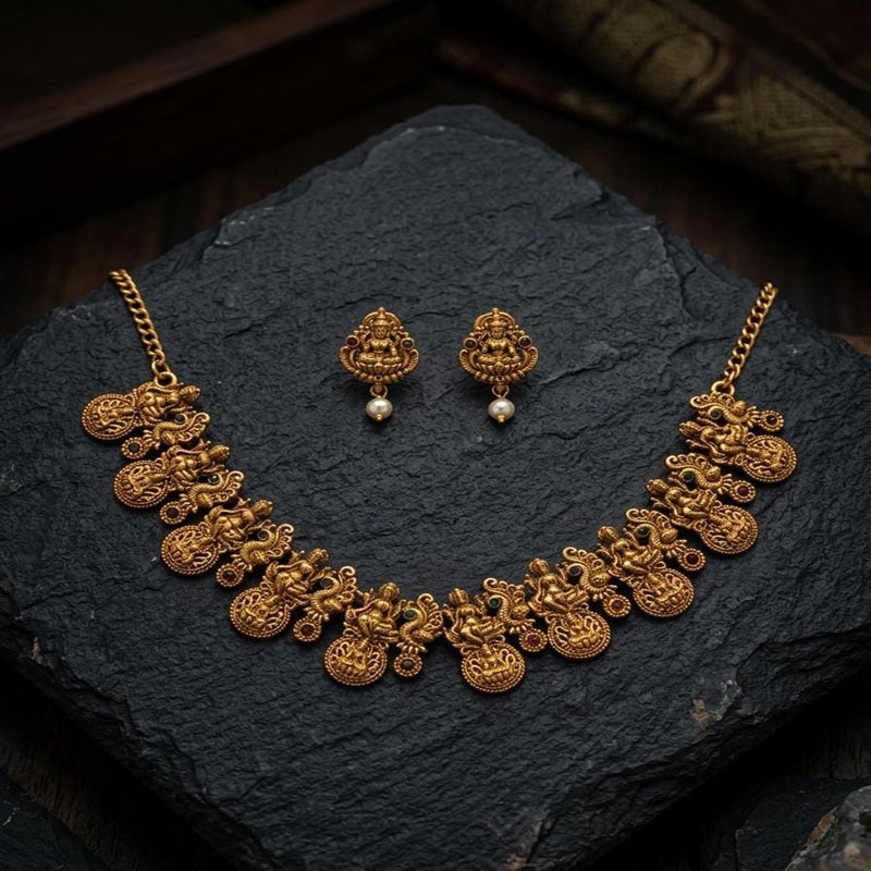 Gold necklace and earrings