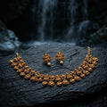 Gold necklace and earrings