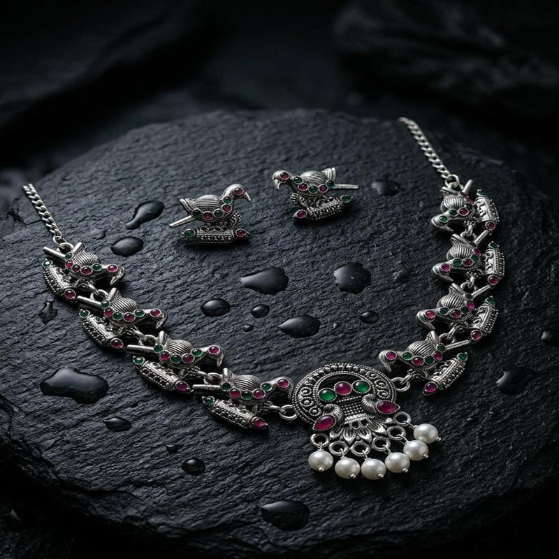 Silver necklace and earrings