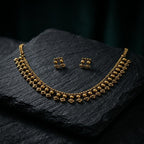 Gold necklace and earrings set