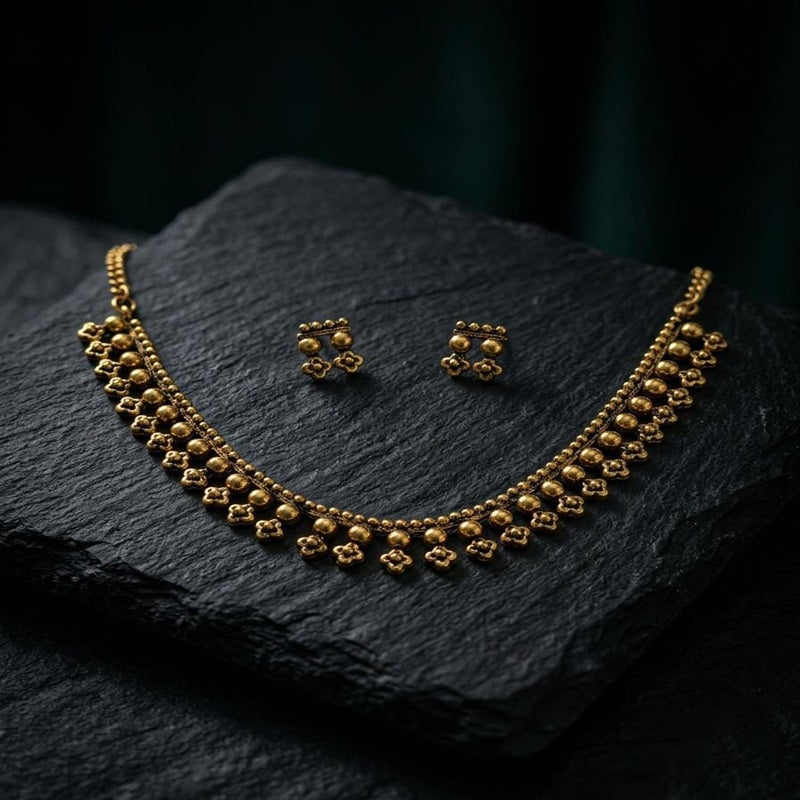 Gold necklace and earrings set