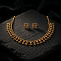 Gold necklace and earrings set